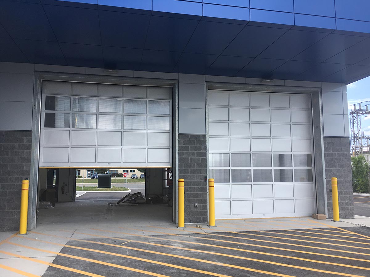 Commercial garage door for mechanic shop - Mckee Horrigan Inc.