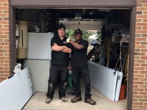 Team members building Residential garage doors - Mckee Horrigan Inc.